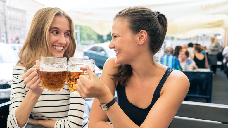 Two women drinking Czech beer