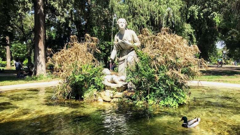 sculpture featuring woman and baby