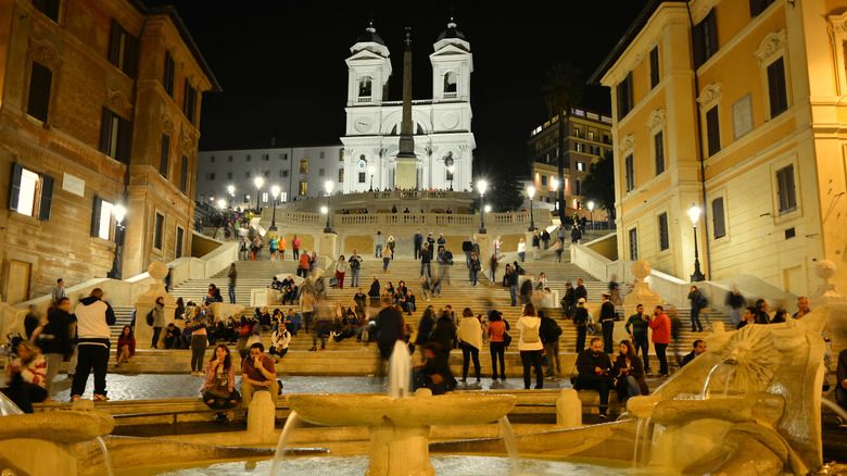 tourists at the Spanish Steps at night