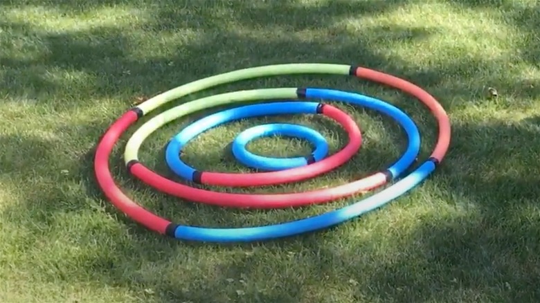 Pool noodle ball toss set-up