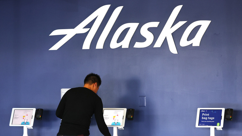 Alaska Airlines logo at check-in
