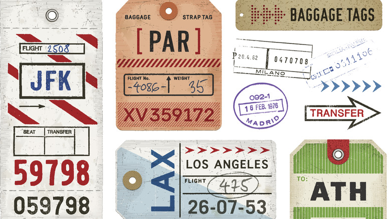 collection of vintage luggage tags