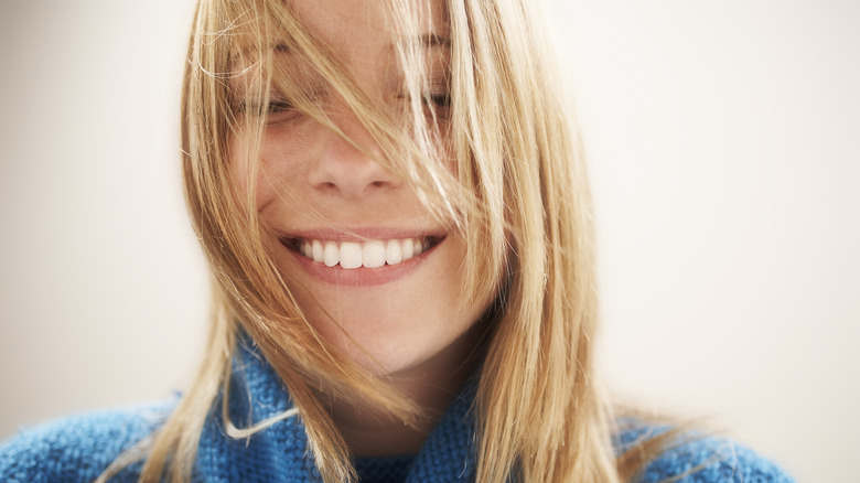 woman with toothy smile