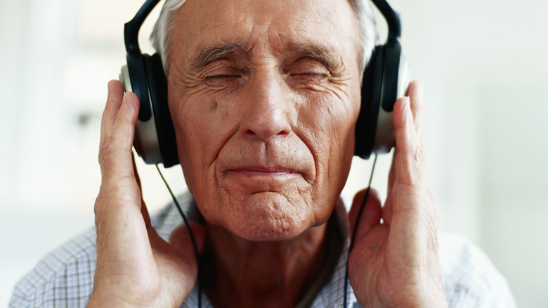 older gentleman with headphones