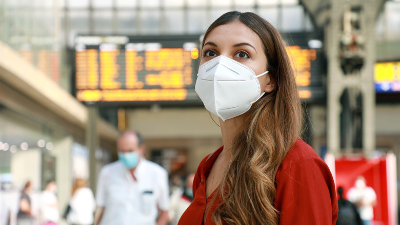 woman wearing mask in airport