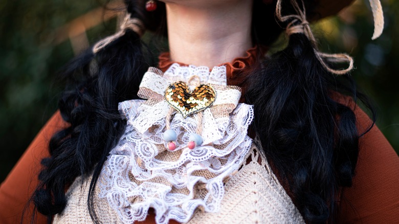 Clothes with decorative bows and ruffles