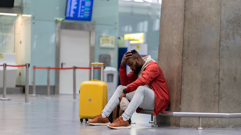 Upset traveler at airport