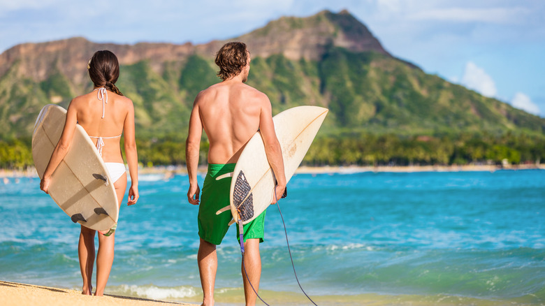 Surfers on Waikiki Beach 