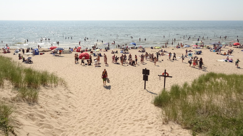 Beachgoers lounge at Lake Michigan