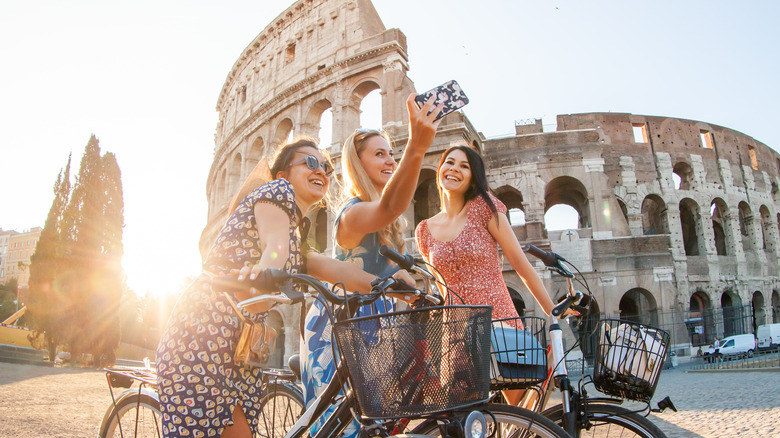 Women biking in rome