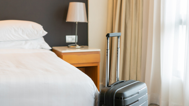 Suitcase in hotel room