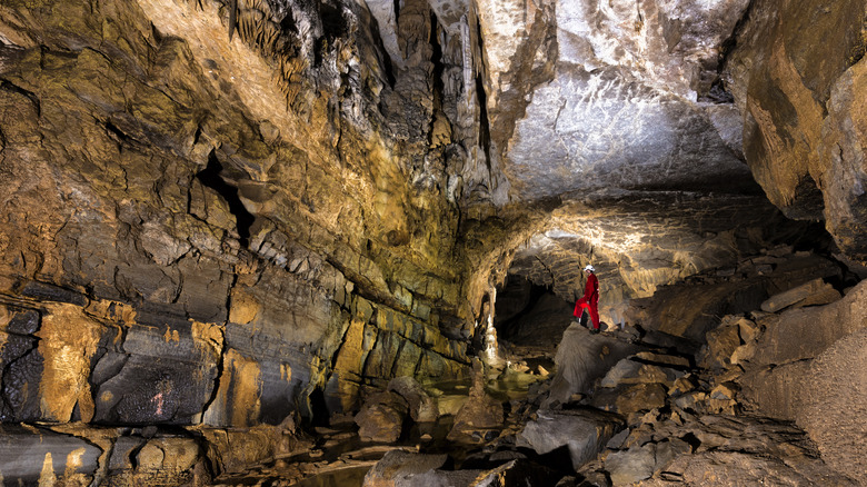 Person in dark cave