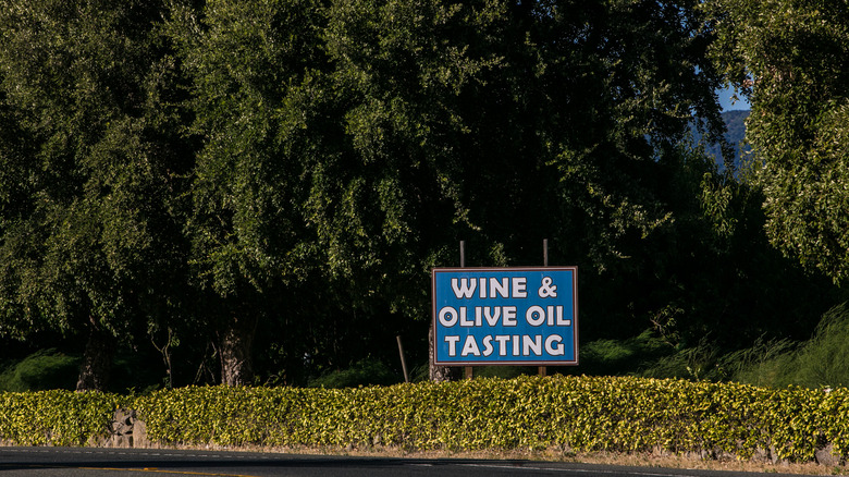 Wine and olive oil sign