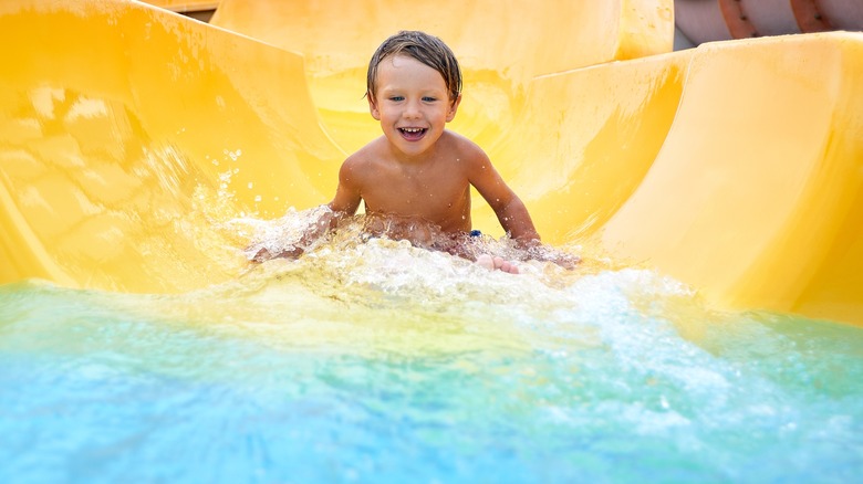 Child on a water slide
