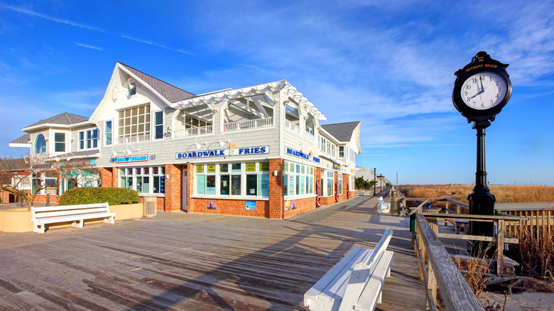 boardwalk, clock, and buildings