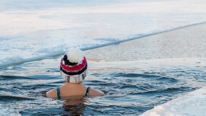 Woman swimming in winter