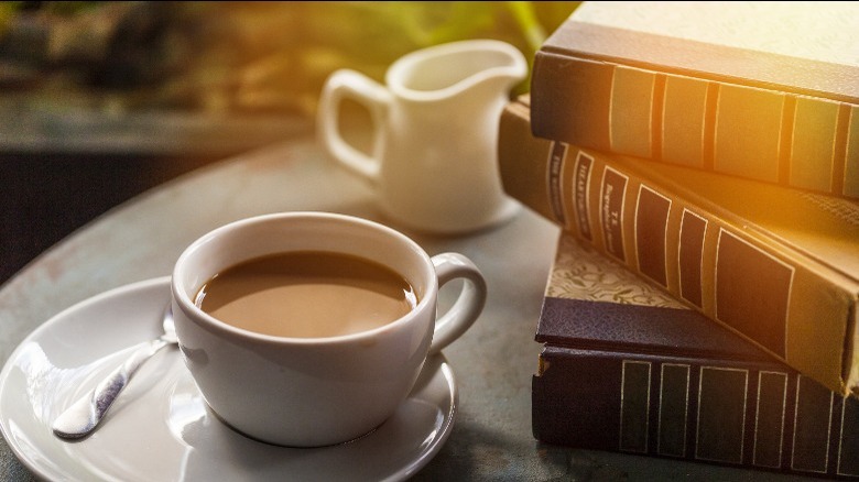 cup of coffee and books