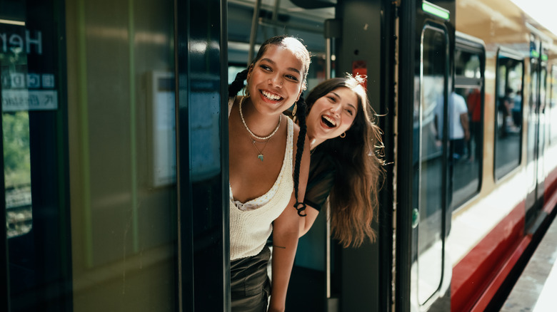 Two friends on train