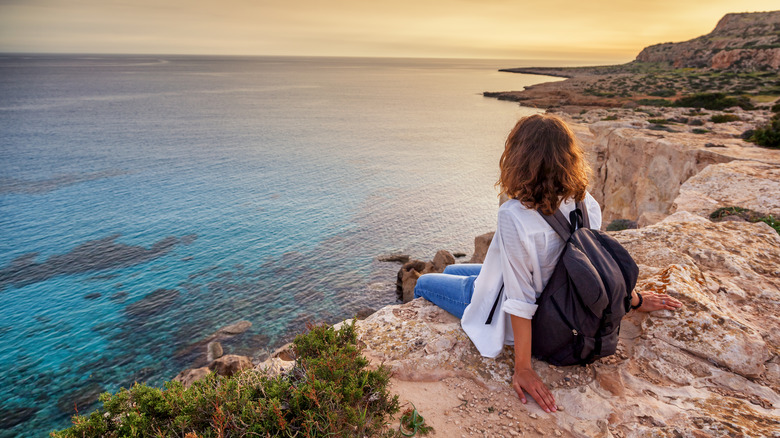 Woman with backpack in Cyprus