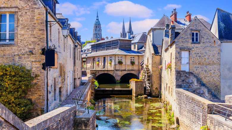 old buildings, towers, and river in France