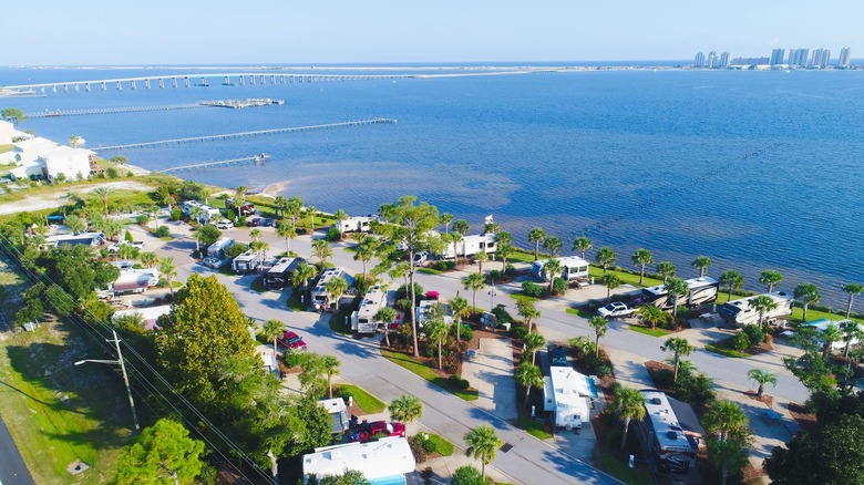 Aerial view of ocean and RVs