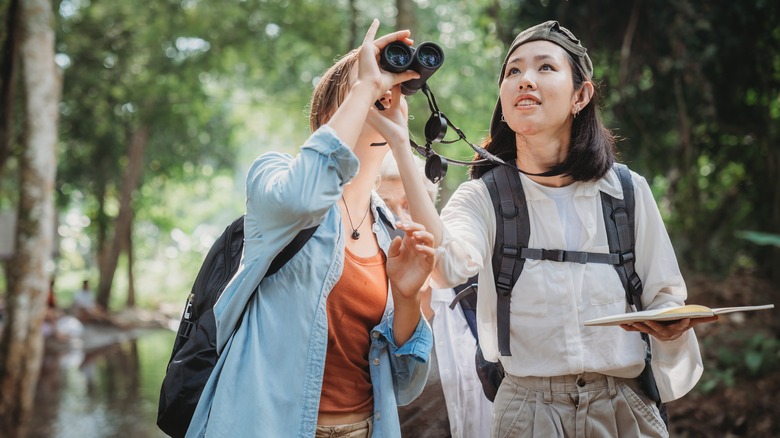 Two women birdwatching