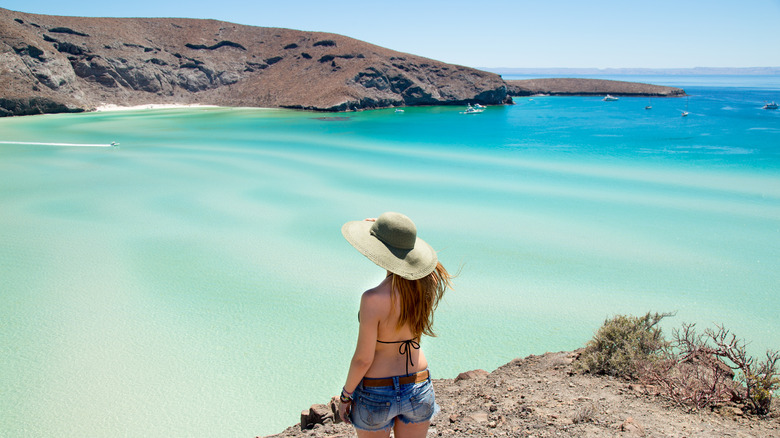 Woman looking at Playa Balandra