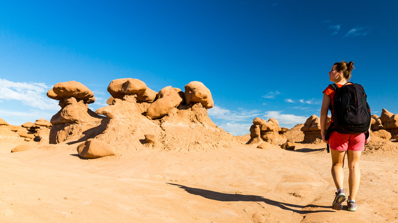 woman hiking in Goblin Valley