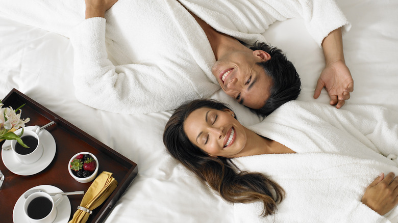 couple on hotel bed