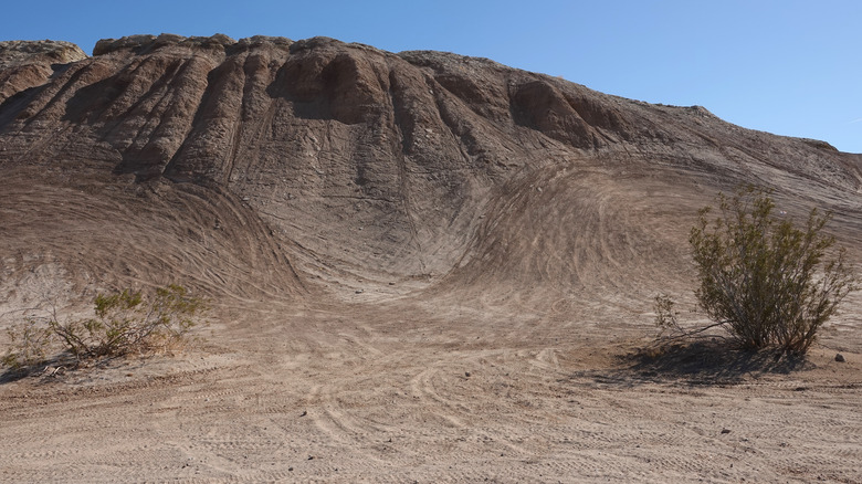 Hills with tire marks