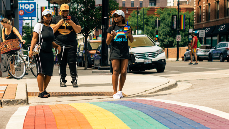 A rainbow themed LGBTQ+ sidewalk in Chicago's Boys Town neighborhood