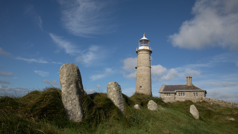 Island lighthouse with large stones