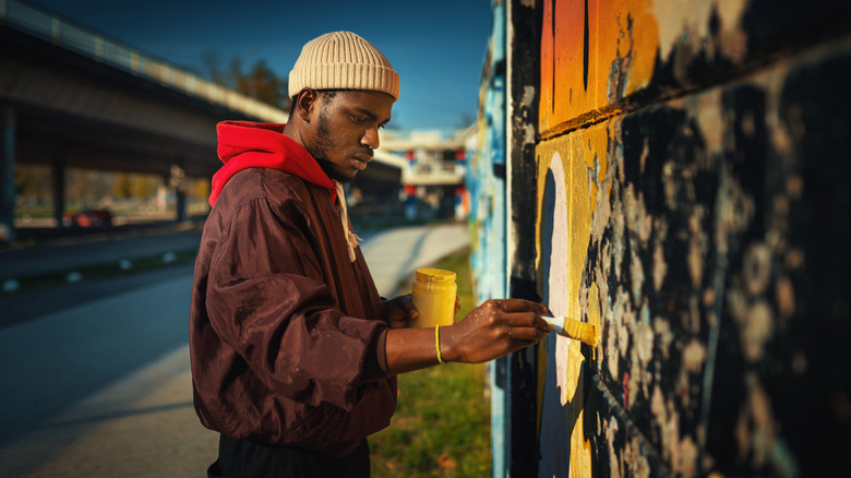 Artist painting street art