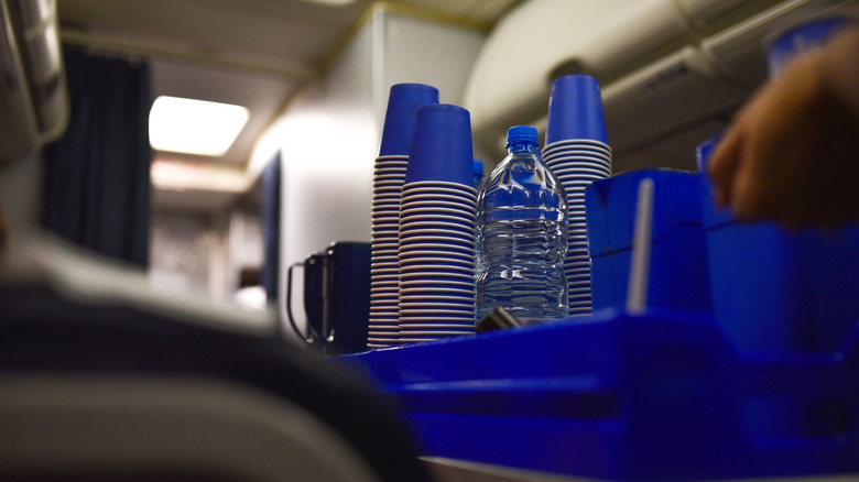 Cups on flight attendant trolley
