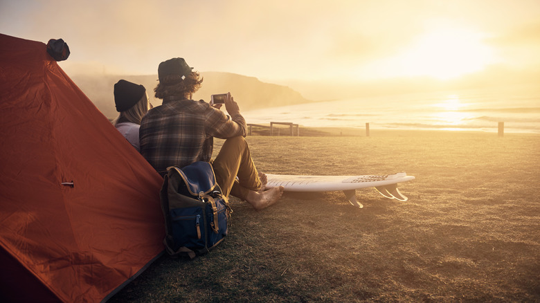 Couple camping on beach