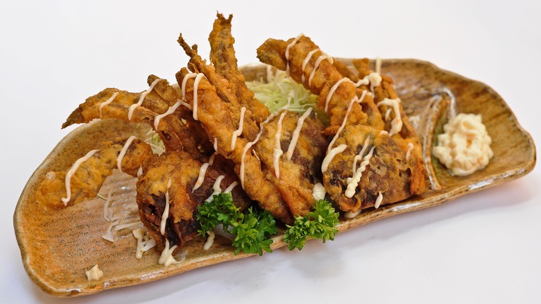 Soft shell crab on wooden plate