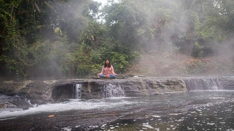 woman meditating by Boiling River