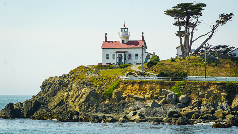 building on oceanside cliff