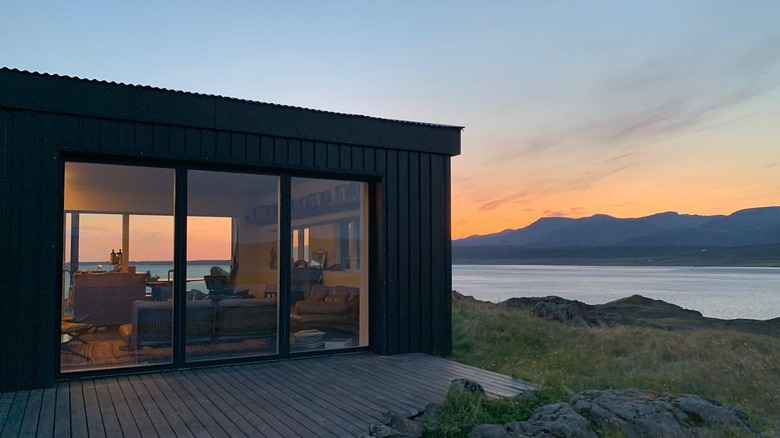 Modern guesthouse and fjord