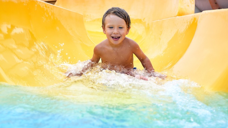 Child on a water slide