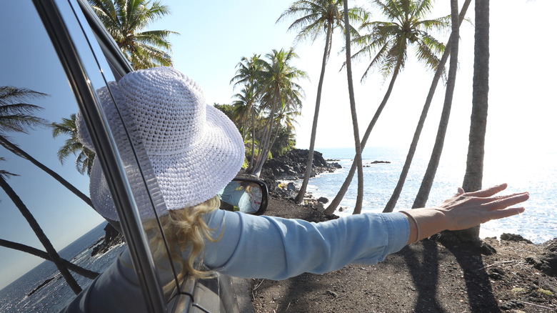 A woman in a car in Hawaii