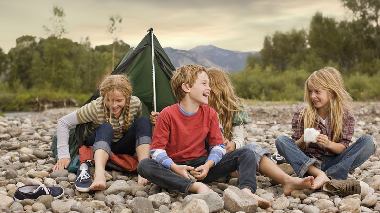 Family camping in wilderness