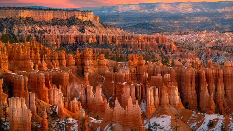 red rock spires amongst snow