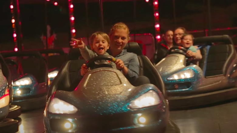 Families on bumper cars