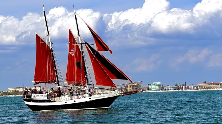 Sailboat with red sails