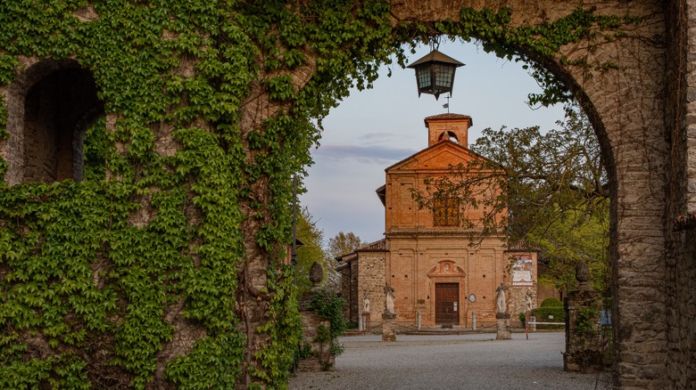 Vine-covered brick archway