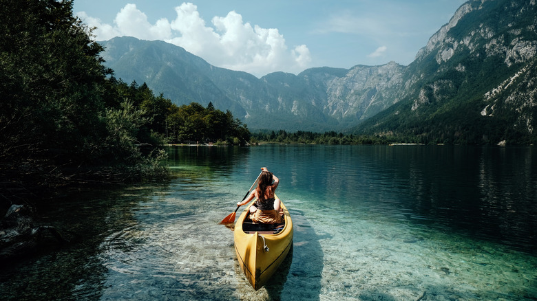 Woman canoeing on Lake Bohinj