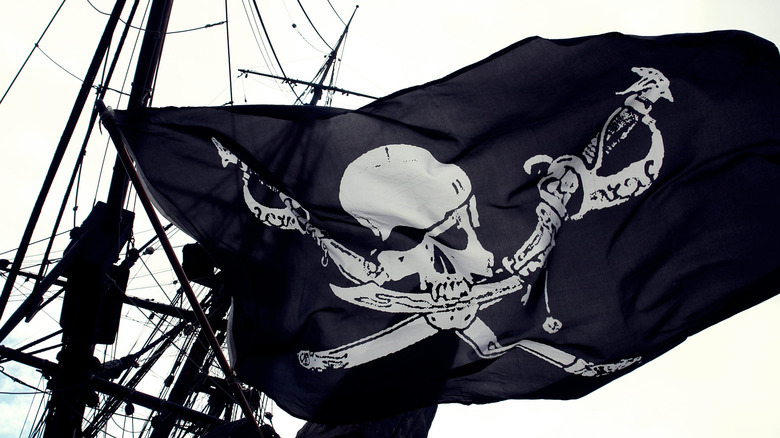 black pirate flag with a traditional skull design