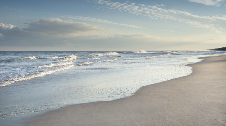 Topsail Beach at dusk with the waves crashing along the shoreline