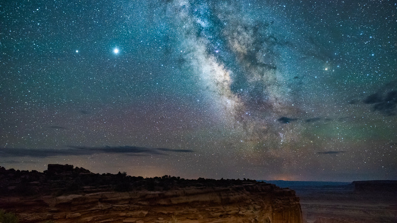The Milky Way and starry night sky over Canyonlands National Park